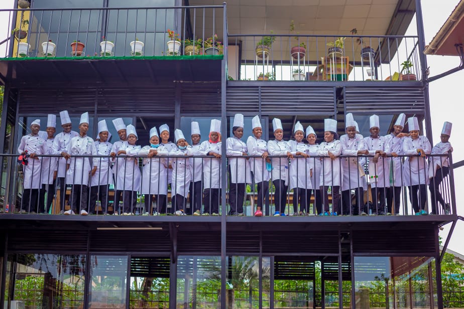 People watching a concert. Photo with a purple hue